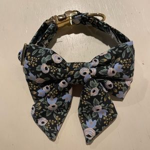 Floral bow on a matching collar